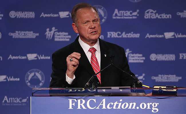 Woman Says Senate Candidate Moore Initiated Sexual Encounter When She Was 14, He Was 32