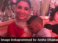 Seen This Pic Of Anushka Sharma Minding Shikhar Dhawan's Son At Reception?