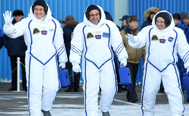 Crew Of Three Docks At International Space Station