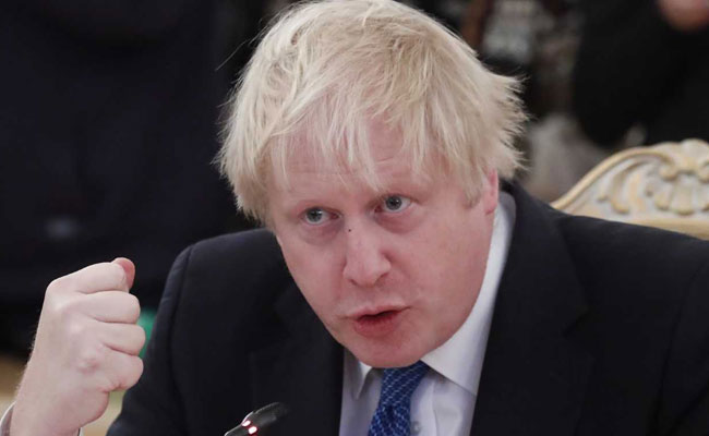 UK's Boris Johnson, On Moscow Visit, Tells Russia To Stop Meddling In Europe