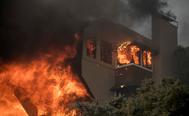 Hundreds Of Homes Destroyed By Out-Of-Control California Wildfire