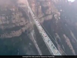 Dare To Walk On 'World's Longest Glass Bridge'? Video Will Make You Dizzy Dare To Walk On 'World's Longest Glass Bridge'? Video Will Make You Dizzy