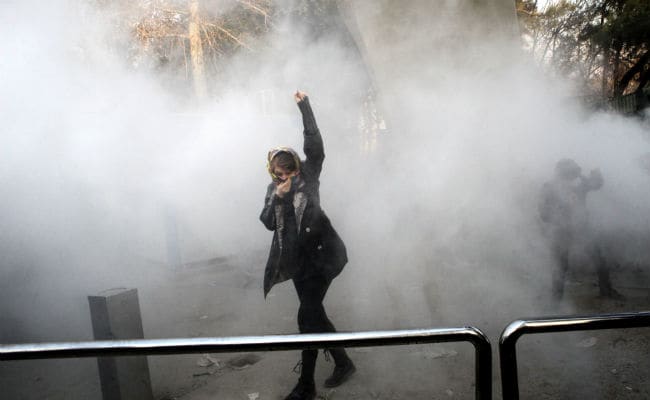 Iran Protesters Attack Religious School As US Sanction Tensions Mount