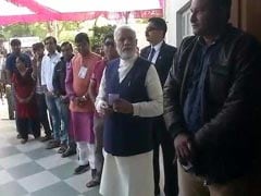 In Gujarat, PM Modi Waits In Voting Queue, Touches Brother's Feet After
