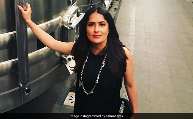 Watch: Just Salma Hayek Dancing In A Bathrobe - Here's Why