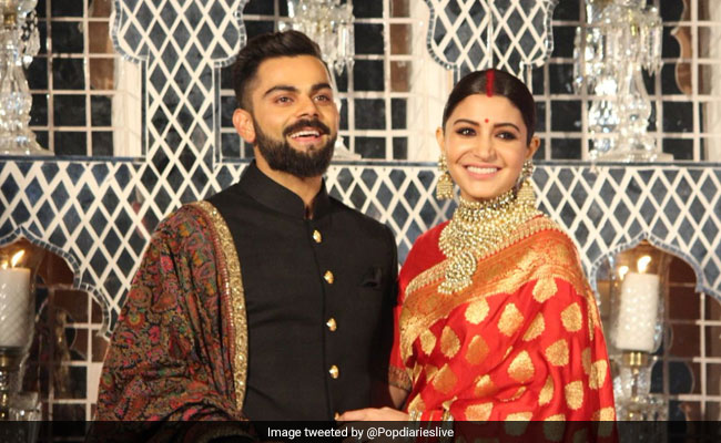 #VirushkaReception: अनुष्का की लाल बनारसी साड़ी और विराट के बंदगला पहनने का खुल गया राज