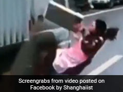 VIDEO : तेज रफ्तार ट्रक के नीचे आ गई यह महिला, मौत से इंच भर की दूरी का हैरान करने वाला नजारा