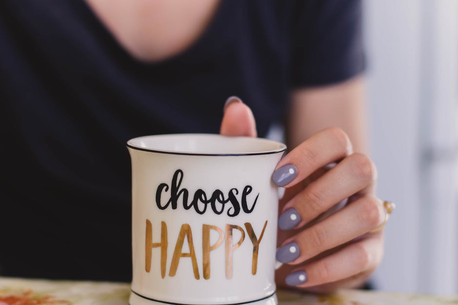 woman with a happy cup