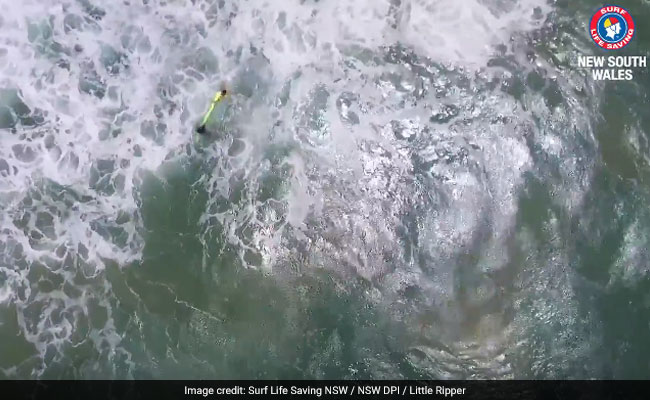 Watch: Rough Seas, 2 Swimmers And A Rescue By Drone