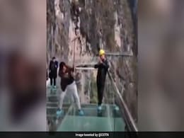 Watch: 600 Feet In The Sky, Workers Smash Glass Bridge Watch: 600 Feet In The Sky, Workers Smash Glass Bridge