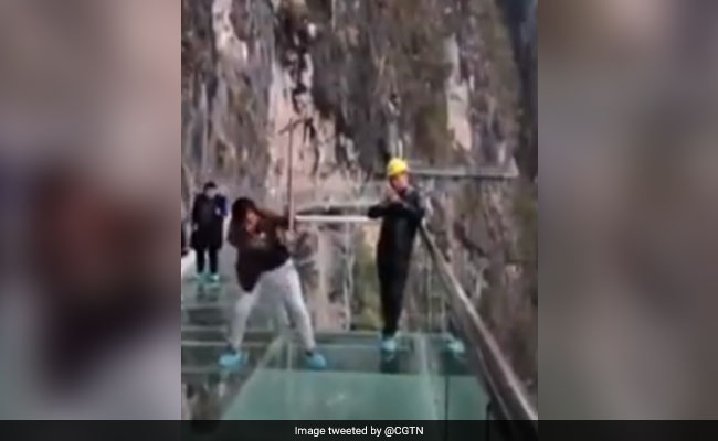 Watch: 600 Feet In The Sky, Workers Smash Glass Bridge