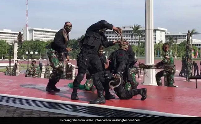 Watch Indonesian Troops Drink Blood From Headless Snakes For Secretary Mattis
