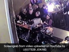 Video Shows Police Officer Hitting His Wife At Bar With Cellphone