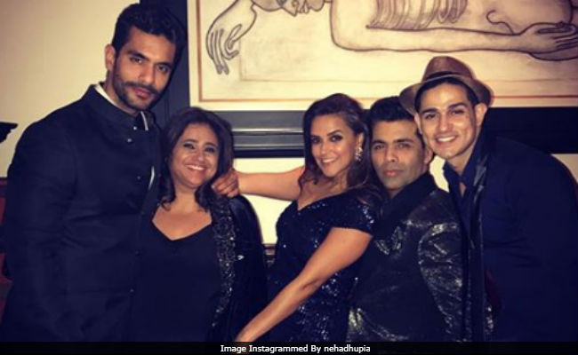 <i>Bigg Boss 11</i>'s Priyank Sharma Poses With Karan Johar And Neha Dhupia At Shah Rukh Khan's Party