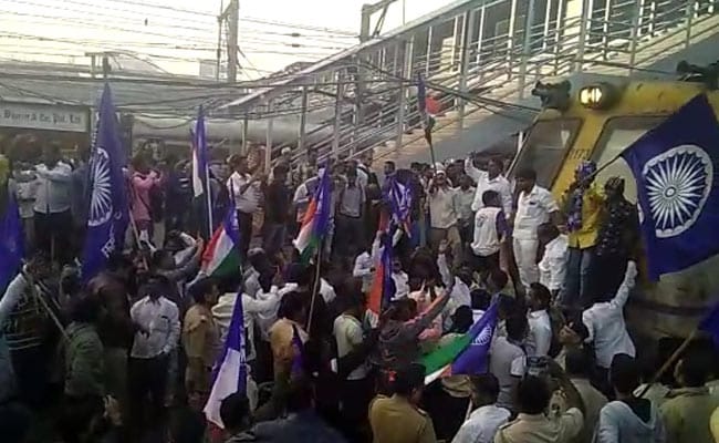 Image result for Maharashtra bandh: Protesters stop trains; school buses remain off road in Mumbai