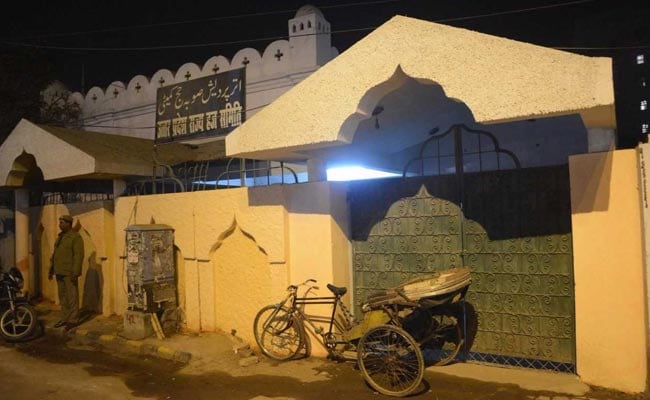 Official Removed After Repainting Saffron Wall Of Haj Complex in Uttar Pradesh