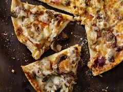 Eating A Pizza: These Secret Hacks Will Make Your Pizzas Taste A Lot Better! Eating A Pizza: These Secret Hacks Will Make Your Pizzas Taste A Lot Better!