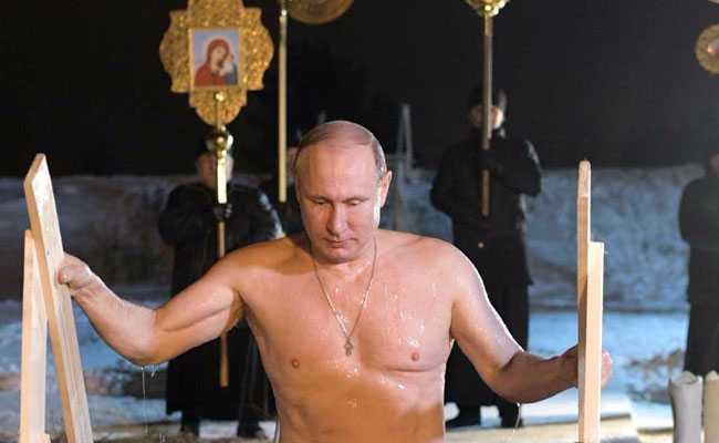 In Pre-Dawn Religious Ceremony, Shirtless Putin Takes Dip In Frozen Lake