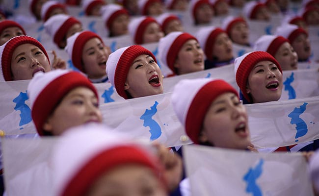 Warm Smiles, Cold Comfort From North Korea's Olympic 'Army Of Beauties'