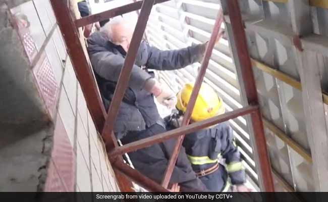 Man Falls From Balcony, Gets Stuck On Advertising Board. Watch Rescue