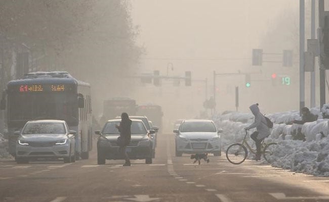 China Issues Highest Pollution Alert As Dense Fog Reduces Visibility