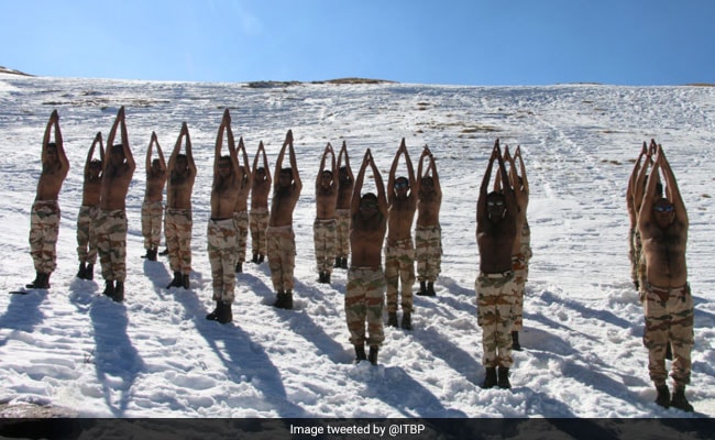 Indo-Tibetan Border Police Soldiers Do Yoga In The Himalayas. See Pics