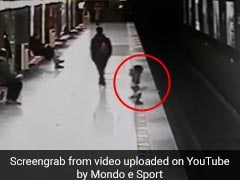 Video: Train Just A Minute Away, Child Falls On Tracks. Saved By Stranger