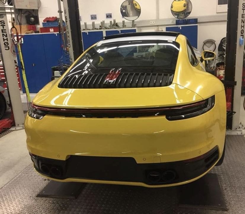 Image of the new-production new Porsche 911 has surfaced online and we finally get to see the car in its undisguised avatar. The car new new exterior and a bunch of other upgrades and will make its global debut towards the end of 2018 or early 2019.
