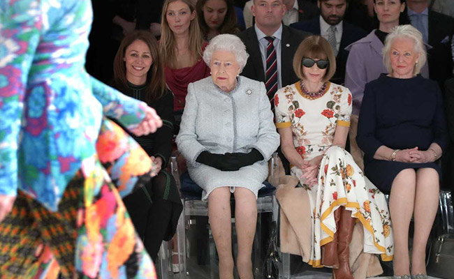 Queen Elizabeth II Adds A Royal Touch To The Front Row Of London Fashion Week