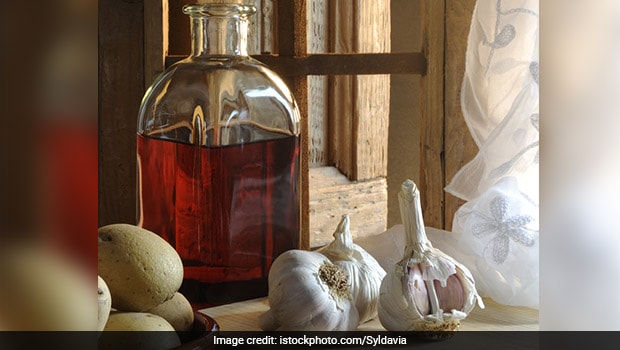Garlic And Red Wine For Weight Loss: Just 3 Tablespoons Of This Potion May Help Burn Belly Fat