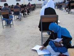 Afghan Mum Cradling Baby During University Exam Goes Viral