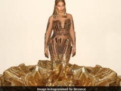 Beyonce's Giant Gold Dress Was Made By Indian Designers Falguni & Shane Peacock