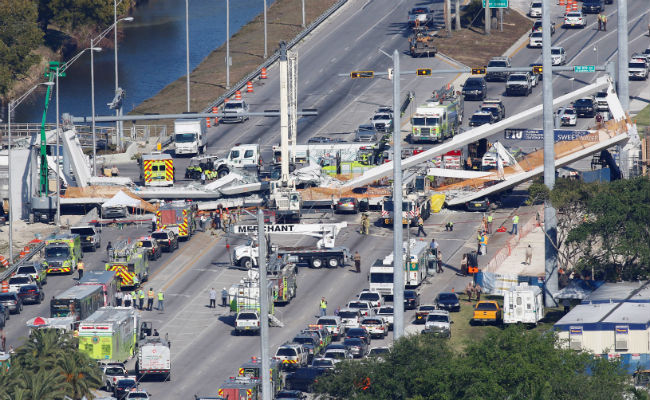 4 People Killed When New Pedestrian Bridge Collapses Near Miami, Crushing Eight Cars Underneath