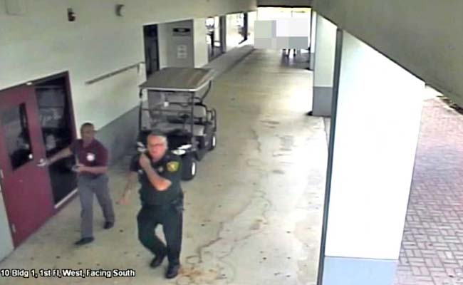 Video Shows Florida Deputy Outside Parkland High School During Rampage