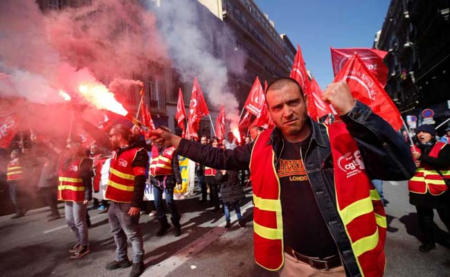 Trains, Flights Grounded As Strikes Challenge Macron Across France