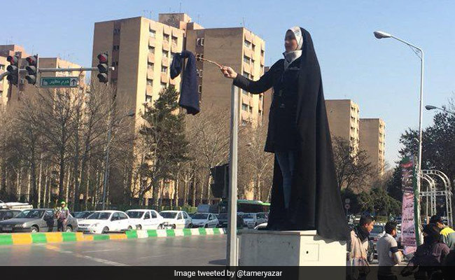 Women In Iran Are Pulling Off Their Headscarves, Hoping For "Turning Point"
