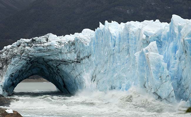 Ice Bridge In Argentine Glacier Collapses