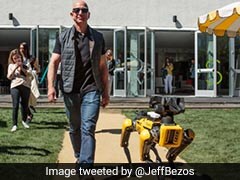 Amazon Boss Jeff Bezos Walks His Robot Dog. It Can Even Open Doors