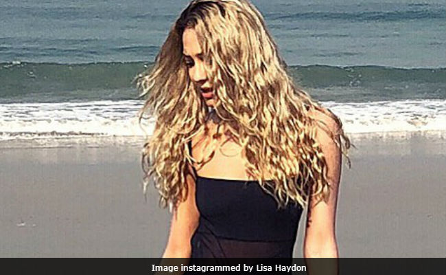 Seen Lisa Haydon's Cycling On The Beach Pics Yet?