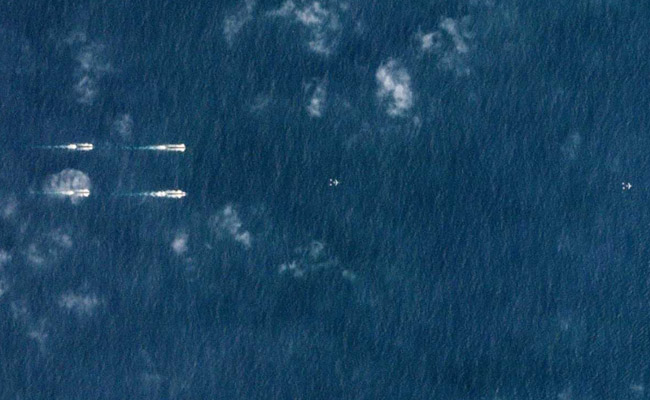 Satellite Images Reveal Show Of Force By Chinese Navy In South China Sea