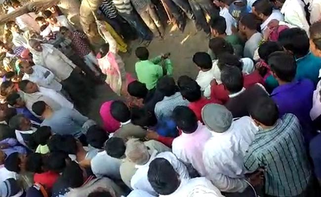 On Video, Woman Tied To Tree, Beaten As People Watch. No One Intervenes