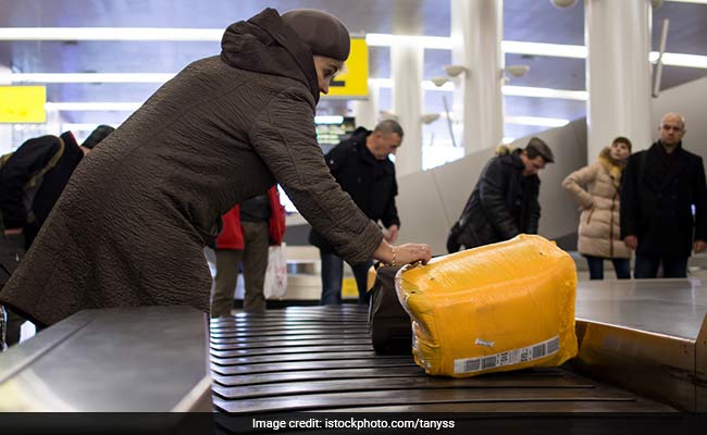 Passenger Gets Unintended Ride On Moscow Baggage Carousel
