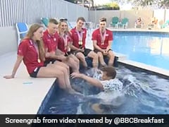BBC Reporter Falls Into Swimming Pool During Live Interview. Watch