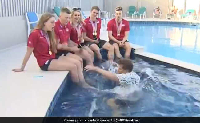 BBC Reporter Falls Into Swimming Pool During Live Interview. Watch