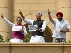 Congress Lawmakers Protest On Parliament Roof, Demand Compensation For Families Of Iraq Victims