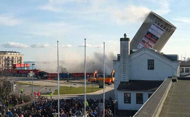 In Demolition Fail, Tower Falls In Wrong Direction, Crushes Building