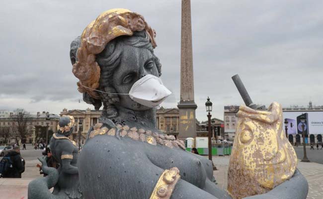 French Statues Get Anti-Pollution Masks In Clean Air Protest