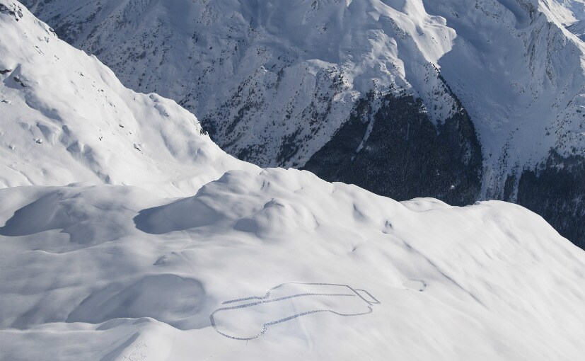 The outline of the Defender was created by snow artist Simon Beck