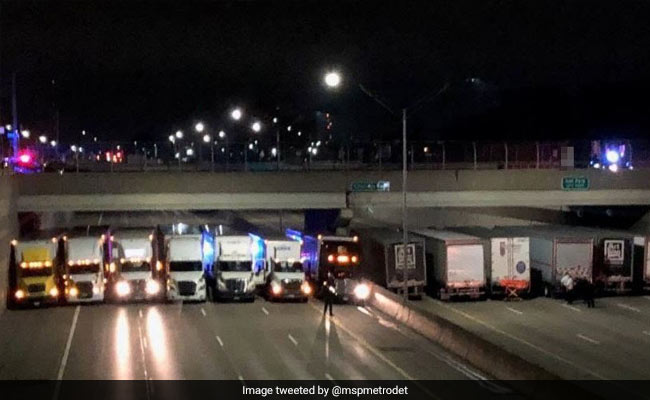 Man Nearly Jumped Off A Bridge. 13 Trucks Formed A Safety Net