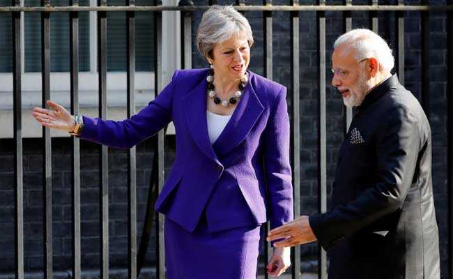 PM Modi Meets Theresa May, Prince Charles; To Meet Queen Later Today